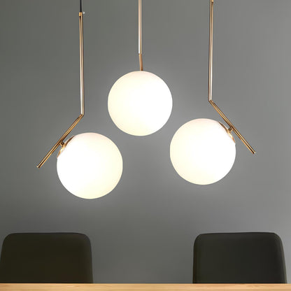 Suspension boule en verre et laiton – Luminaire moderne et raffiné